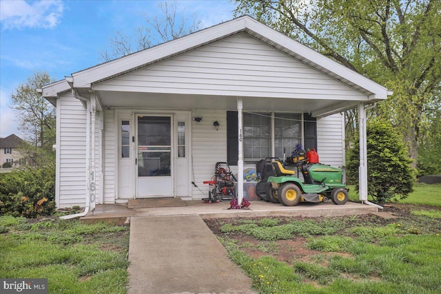bungalow-style house featuring covered porch