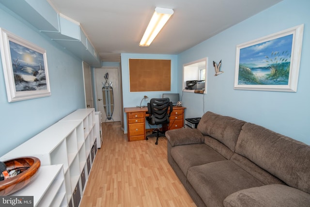 office with light wood-style flooring