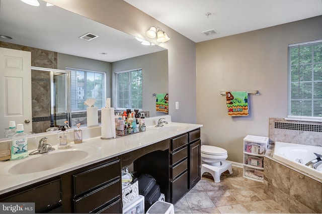 9506 Wilton Pl, Clinton, MD 20735 - full bathroom with a bath, double vanity, toilet, a stall shower, and baseboards
