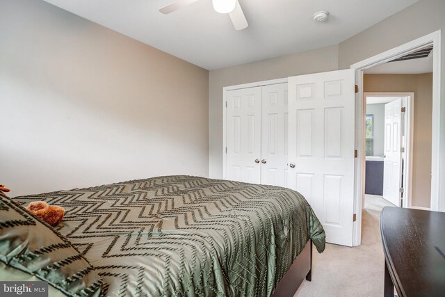 9506 Wilton Pl, Clinton, MD 20735 - bedroom with light colored carpet, a closet, and a ceiling fan