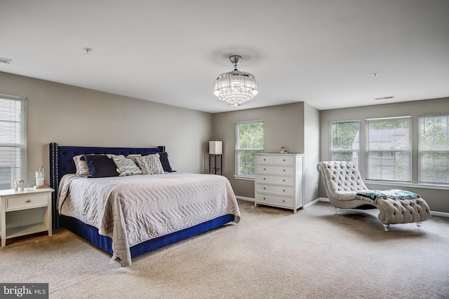 9506 Wilton Pl, Clinton, MD 20735 - carpeted bedroom featuring a chandelier and baseboards