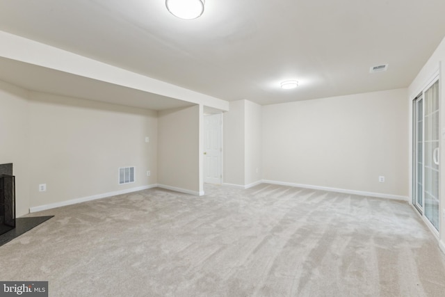 finished below grade area with carpet flooring and baseboards