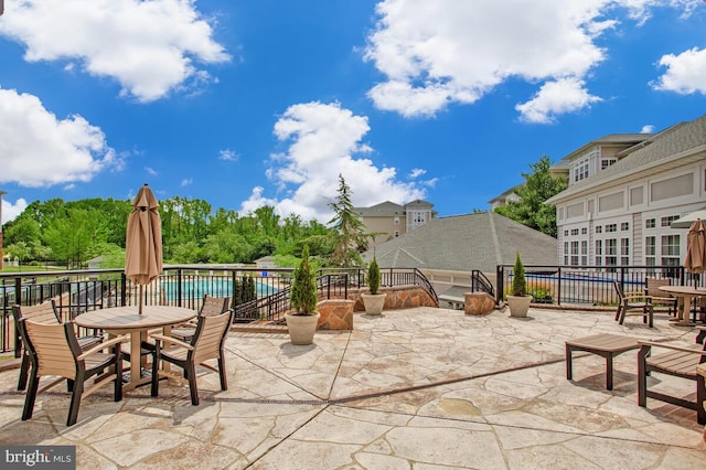13301 New Acadia Ln Unit 207, Upper Marlboro, MD 20774 - view of patio featuring fence and outdoor dining space