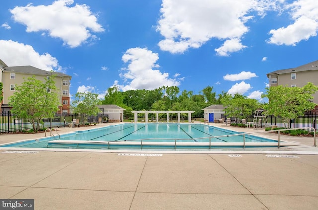 13301 New Acadia Ln Unit 207, Upper Marlboro, MD 20774 - community pool featuring fence and a patio