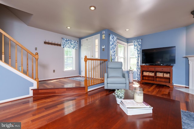 living room with stairway, baseboards, hardwood / wood-style floors, and recessed lighting