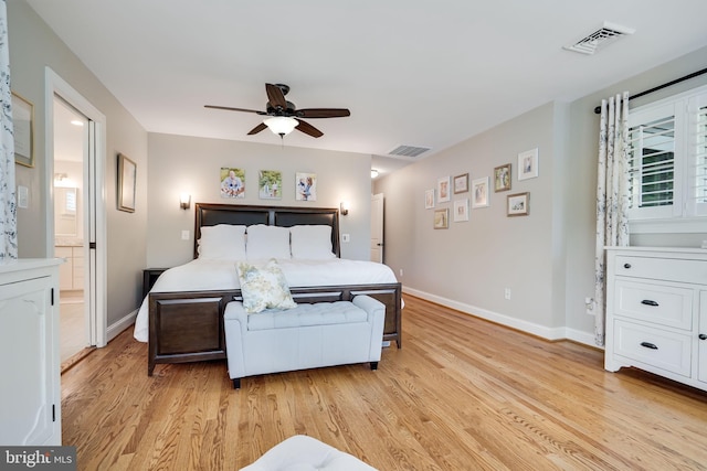 3207 19th St N, Arlington, VA 22201 - bedroom with baseboards, light wood-style floors, connected bathroom, and ceiling fan