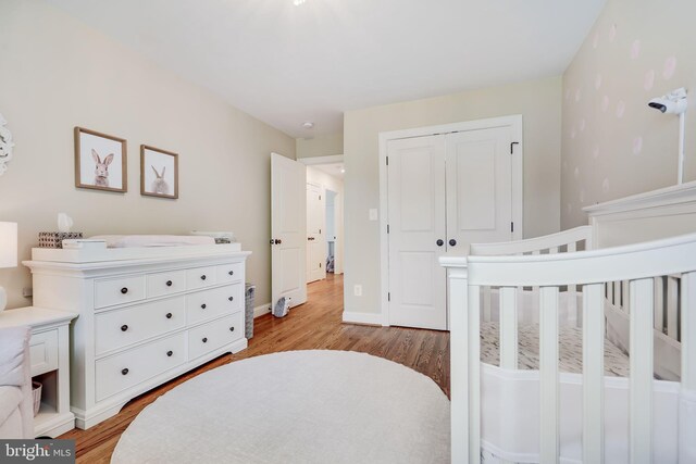 3207 19th St N, Arlington, VA 22201 - bedroom with light wood-style floors, a closet, and baseboards
