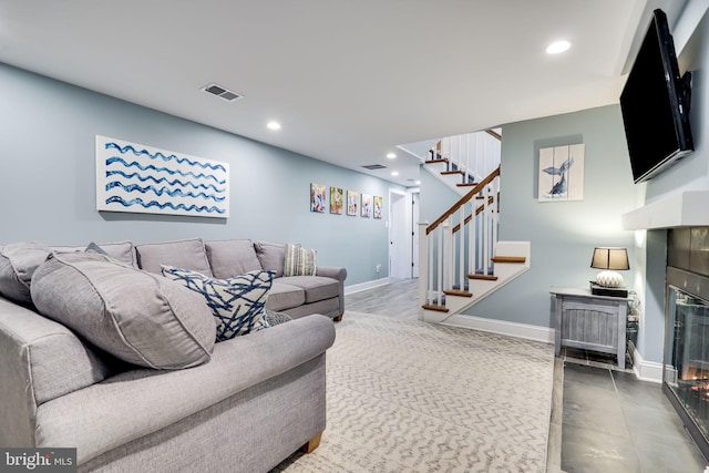 3207 19th St N, Arlington, VA 22201 - living area with stairs, recessed lighting, baseboards, and a glass covered fireplace