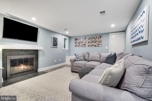 3207 19th St N, Arlington, VA 22201 - living room with wood finished floors, recessed lighting, a fireplace with flush hearth, and baseboards