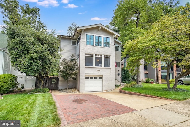3207 19th St N, Arlington, VA 22201 - traditional-style home with brick siding, decorative driveway, and an attached garage