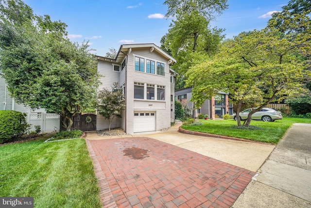 3207 19th St N, Arlington, VA 22201 - view of front of home featuring decorative driveway and a garage