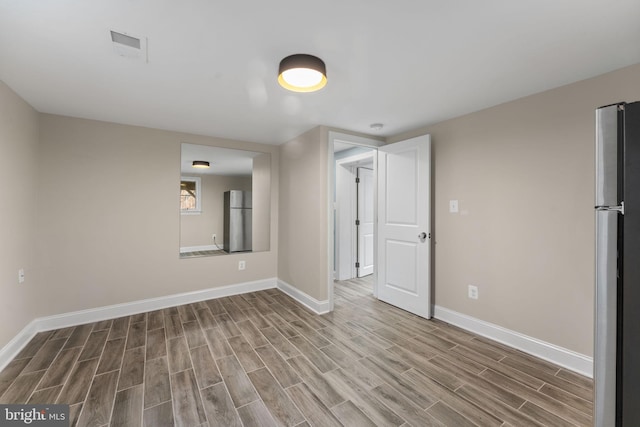 3207 19th St N, Arlington, VA 22201 - unfurnished room with wood finished floors and baseboards