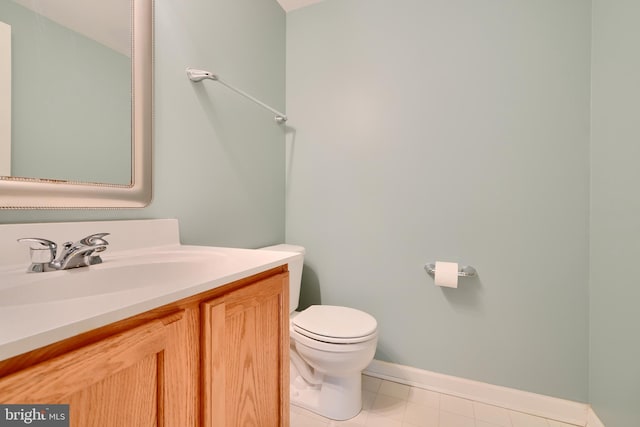 5012 Strawbridge Ter, Perry Hall, MD 21128 - bathroom with toilet, baseboards, vanity, and tile patterned flooring