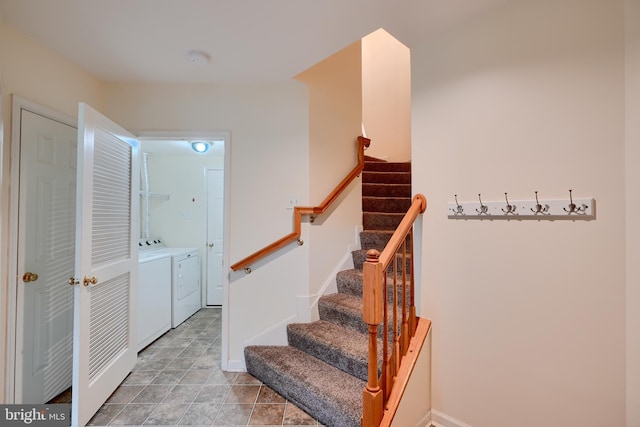 5012 Strawbridge Ter, Perry Hall, MD 21128 - stairway featuring washing machine and clothes dryer and baseboards