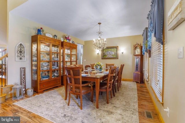 239 Abishire Way, Chambersburg, PA 17202 - dining area with a chandelier, baseboards, visible vents, and light wood-style flooring