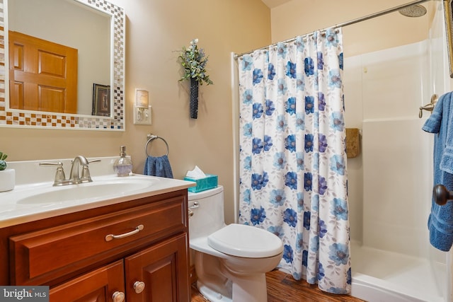 239 Abishire Way, Chambersburg, PA 17202 - bathroom with vanity, a shower stall, toilet, and wood finished floors