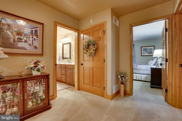 239 Abishire Way, Chambersburg, PA 17202 - hallway featuring light colored carpet, baseboards, and visible vents