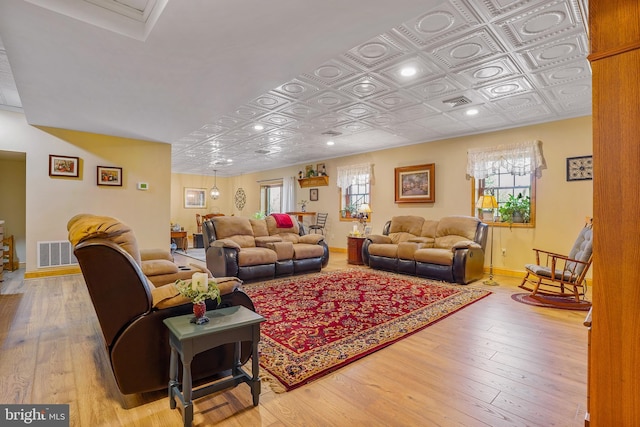 239 Abishire Way, Chambersburg, PA 17202 - living room featuring baseboards, wood finished floors, and visible vents