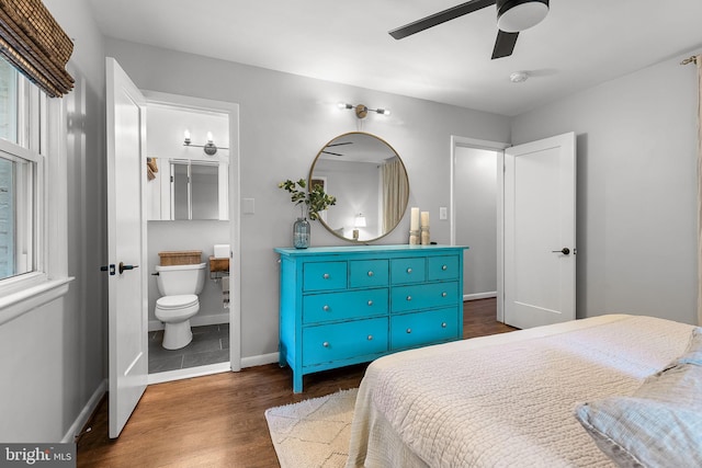 3416 Rustic Way Ln, Falls Church, VA 22044 - bedroom with wood finished floors, baseboards, connected bathroom, and a ceiling fan