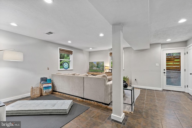 3416 Rustic Way Ln, Falls Church, VA 22044 - living area with recessed lighting, baseboards, and a textured ceiling