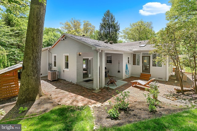 3416 Rustic Way Ln, Falls Church, VA 22044 - rear view of house with entry steps, central AC unit, a patio, roof with shingles, and crawl space