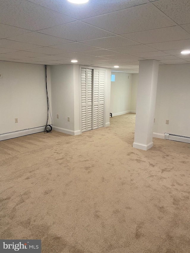 1148 Tabor Plz, Philadelphia, PA 19111 - finished below grade area featuring baseboards, a drop ceiling, baseboard heating, a baseboard radiator, and carpet