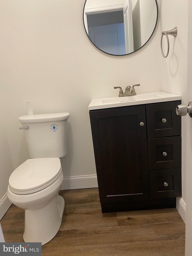 1148 Tabor Plz, Philadelphia, PA 19111 - bathroom featuring toilet, baseboards, wood finished floors, and vanity