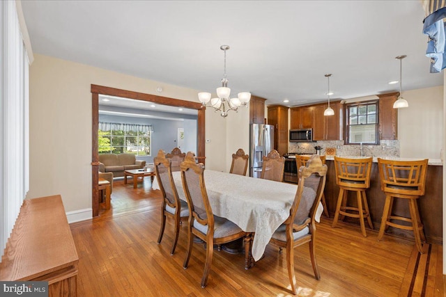 226 Washington Ter, Audubon, NJ 08106 - dining space with a chandelier, light wood finished floors, recessed lighting, and baseboards