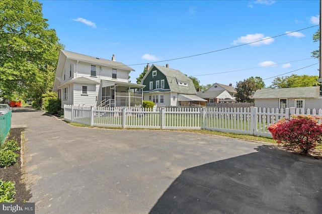 226 Washington Ter, Audubon, NJ 08106 - view of front of property featuring a sunroom and a chimney