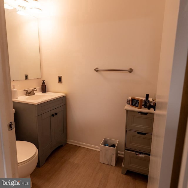4 Country Ln, Westampton, NJ 08060 - half bath featuring vanity, toilet, wood finished floors, and baseboards