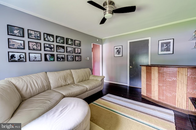 1109 Neal Dr, Alexandria, VA 22308 - living area with dark wood finished floors, ornamental molding, a ceiling fan, and baseboards