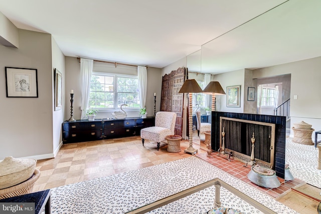 1109 Neal Dr, Alexandria, VA 22308 - living room featuring healthy amount of natural light and baseboards