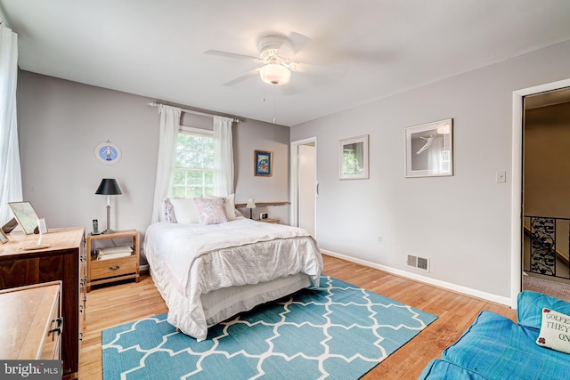 1109 Neal Dr, Alexandria, VA 22308 - bedroom with light wood-style floors, baseboards, and a ceiling fan