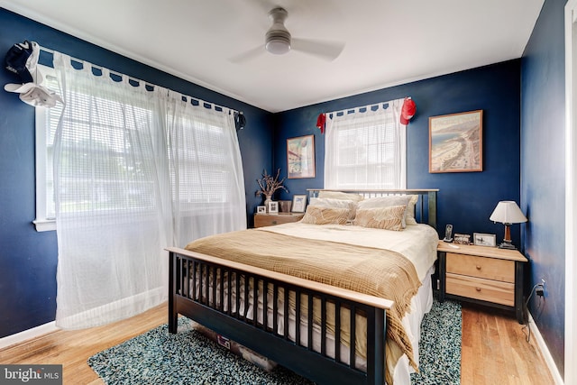 1109 Neal Dr, Alexandria, VA 22308 - bedroom with baseboards, wood finished floors, and a ceiling fan