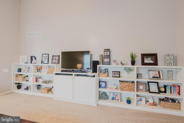 game room with carpet floors and visible vents