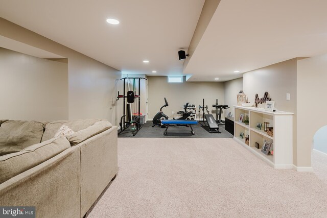 exercise area featuring recessed lighting, baseboards, and carpet