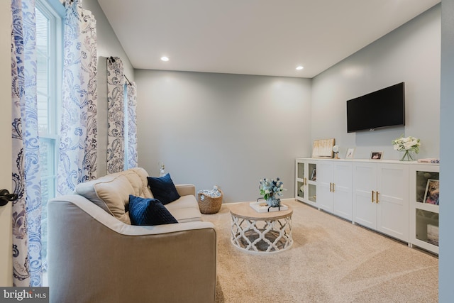 living room with carpet floors and recessed lighting