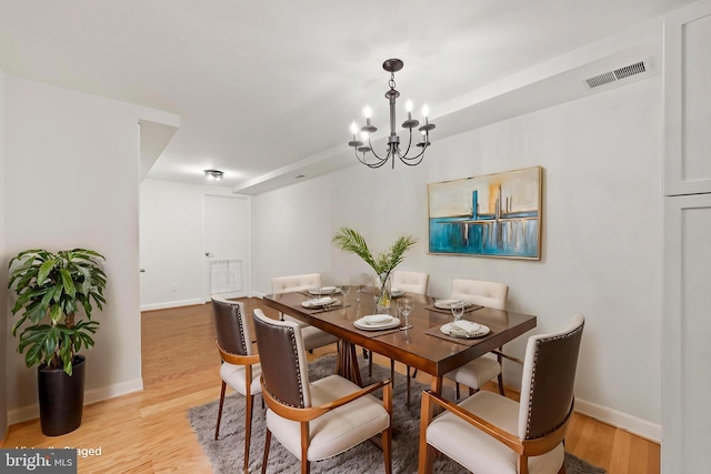 1521 N Van Dorn St, Alexandria, VA 22304 - dining space with light wood-style flooring, baseboards, and a chandelier