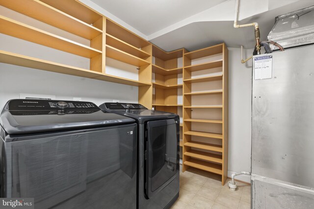 1521 N Van Dorn St, Alexandria, VA 22304 - washroom with washer and dryer and light tile patterned flooring