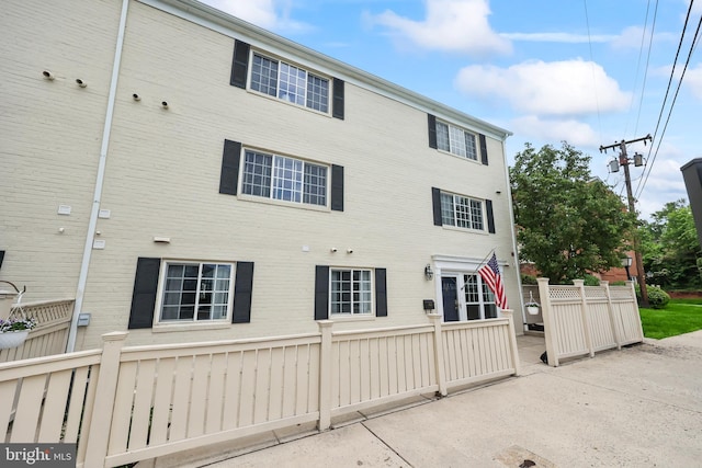 1521 N Van Dorn St, Alexandria, VA 22304 - rear view of house featuring fence and a patio