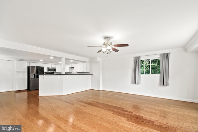 1521 N Van Dorn St, Alexandria, VA 22304 - unfurnished living room with a ceiling fan, wood finished floors, recessed lighting, baseboards, and crown molding