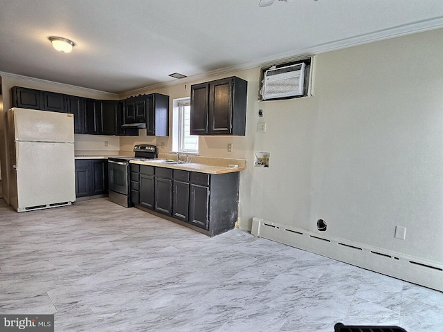 kitchen featuring crown molding, electric range, light countertops, freestanding refrigerator, and a baseboard radiator