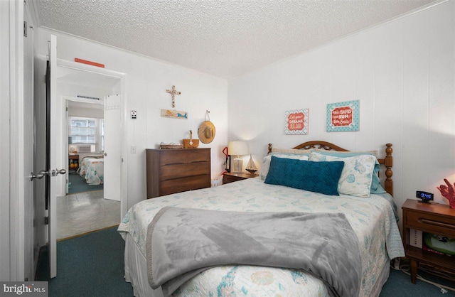 bedroom featuring a textured ceiling