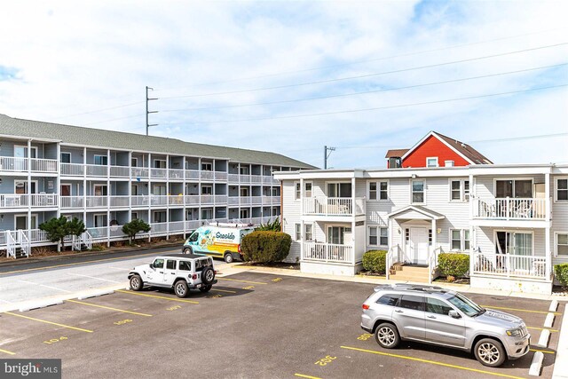 12 72nd St Unit 201, Ocean City, MD 21842 - view of building exterior featuring uncovered parking