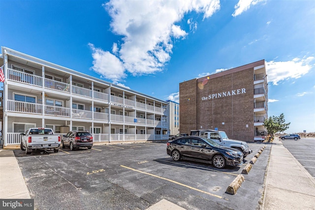 12 72nd St Unit 201, Ocean City, MD 21842 - view of building exterior with uncovered parking