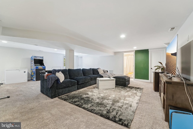 living room featuring recessed lighting, carpet flooring, and visible vents