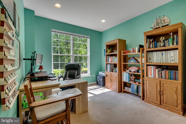 carpeted office featuring recessed lighting and baseboards