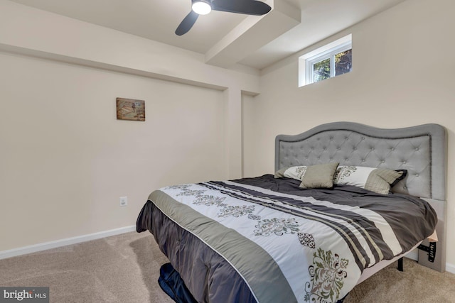 bedroom with baseboards, ceiling fan, and carpet