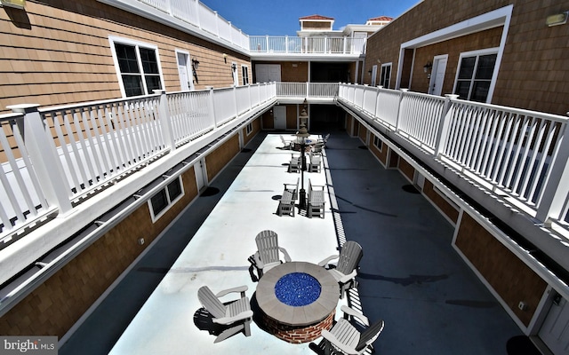 view of property's community featuring outdoor dining space