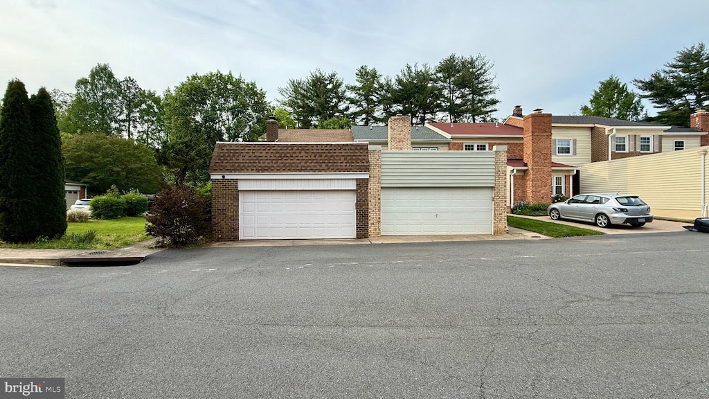 view of front of home with brick siding
